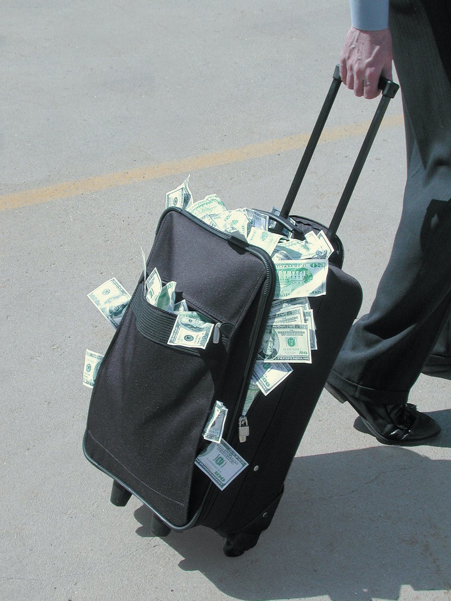 Suitcases of money support senior leaders in business
